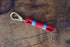 Red Key Chain with Light Blue & Red Whipping